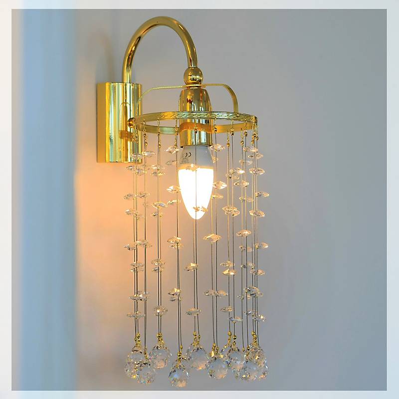 Wandleuchter Tialda Erleuchtung, Gold/Transparent, aus Glas