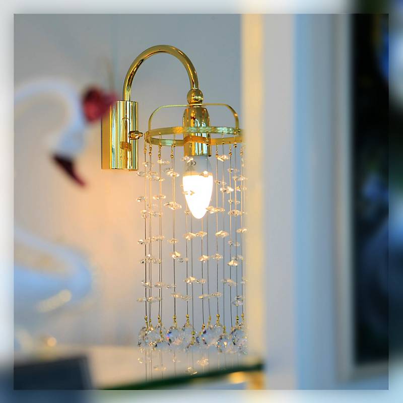 Wandleuchter Tialda Erleuchtung, Gold/Transparent, aus Glas